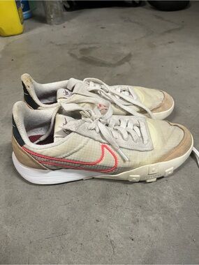 Nike woman’s Beige Sneakers with Coral Swoosh
